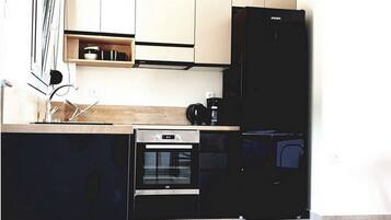 Fridge, microwave, coffee/tea maker, toaster