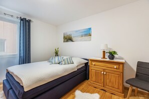 1 habitación, tabla de planchar con plancha, wifi gratis y ropa de cama 