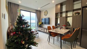 Family Apartment, 1 King Bed with Sofa bed, Balcony, Sea View | Living area