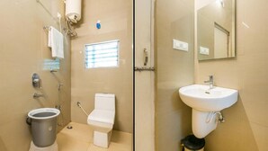 A bathroom with a toilet, bidet, and sink. - Vihar Holiday Resorts (Araku Valley)