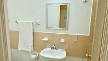 Standard Room, 1 Bedroom | Bathroom | Shower, towels, soap, toilet paper