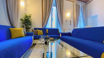 Luxury Condo, Balcony, Sea View | Living area | 32-inch flat-screen TV with digital channels, TV