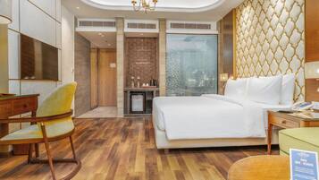 Deluxe Double Room | Minibar, desk, laptop workspace, blackout curtains