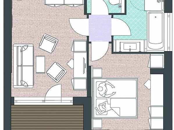 Distribución de una habitación de hotel con cama, escritorio, silla, baño y un pequeño rincón de descanso.