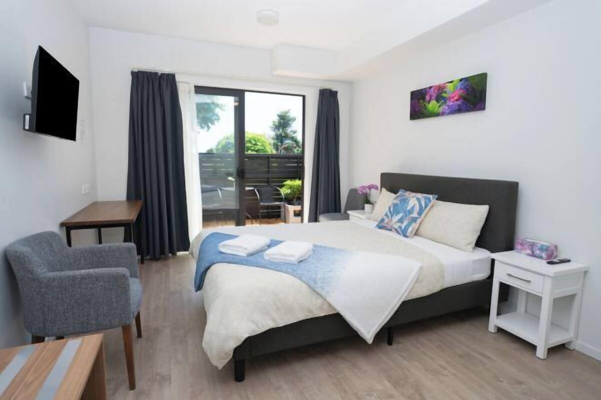 1 bedroom, desk, laptop workspace, iron/ironing board