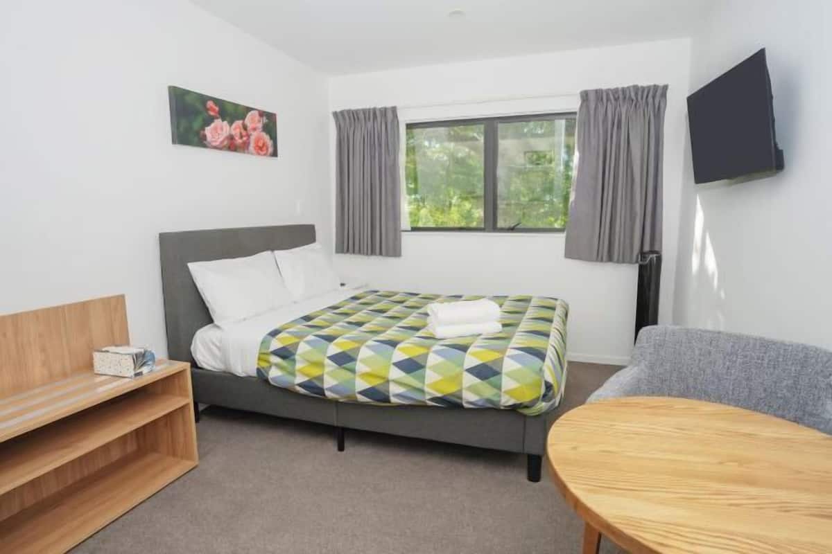 1 bedroom, desk, laptop workspace, iron/ironing board