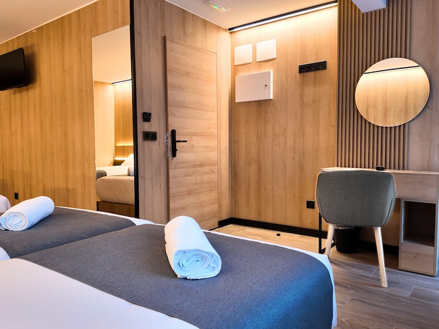 Luxury Quadruple Room | Premium bedding, memory-foam beds, desk, laptop workspace