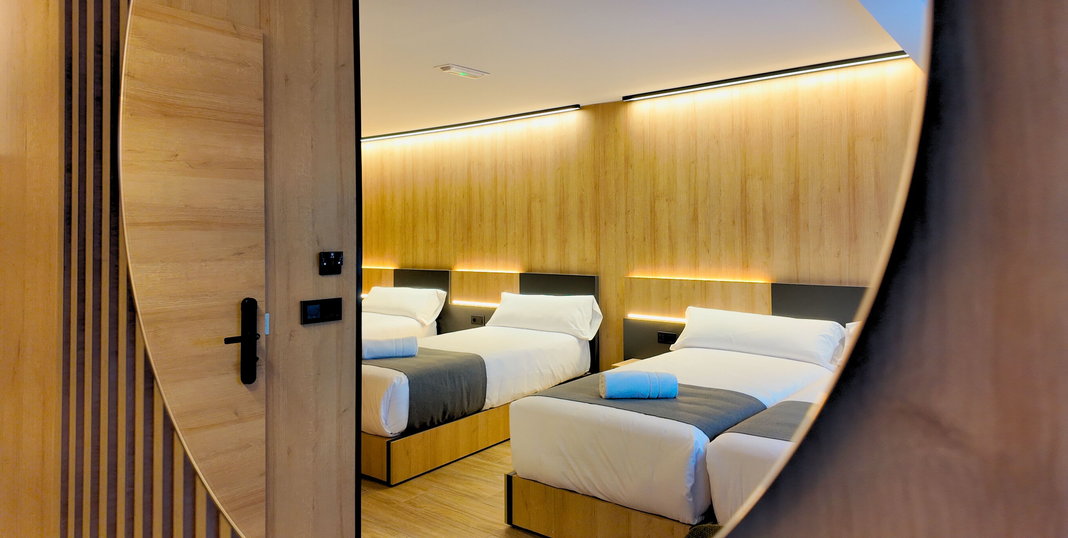 Premium bedding, memory-foam beds, desk, laptop workspace