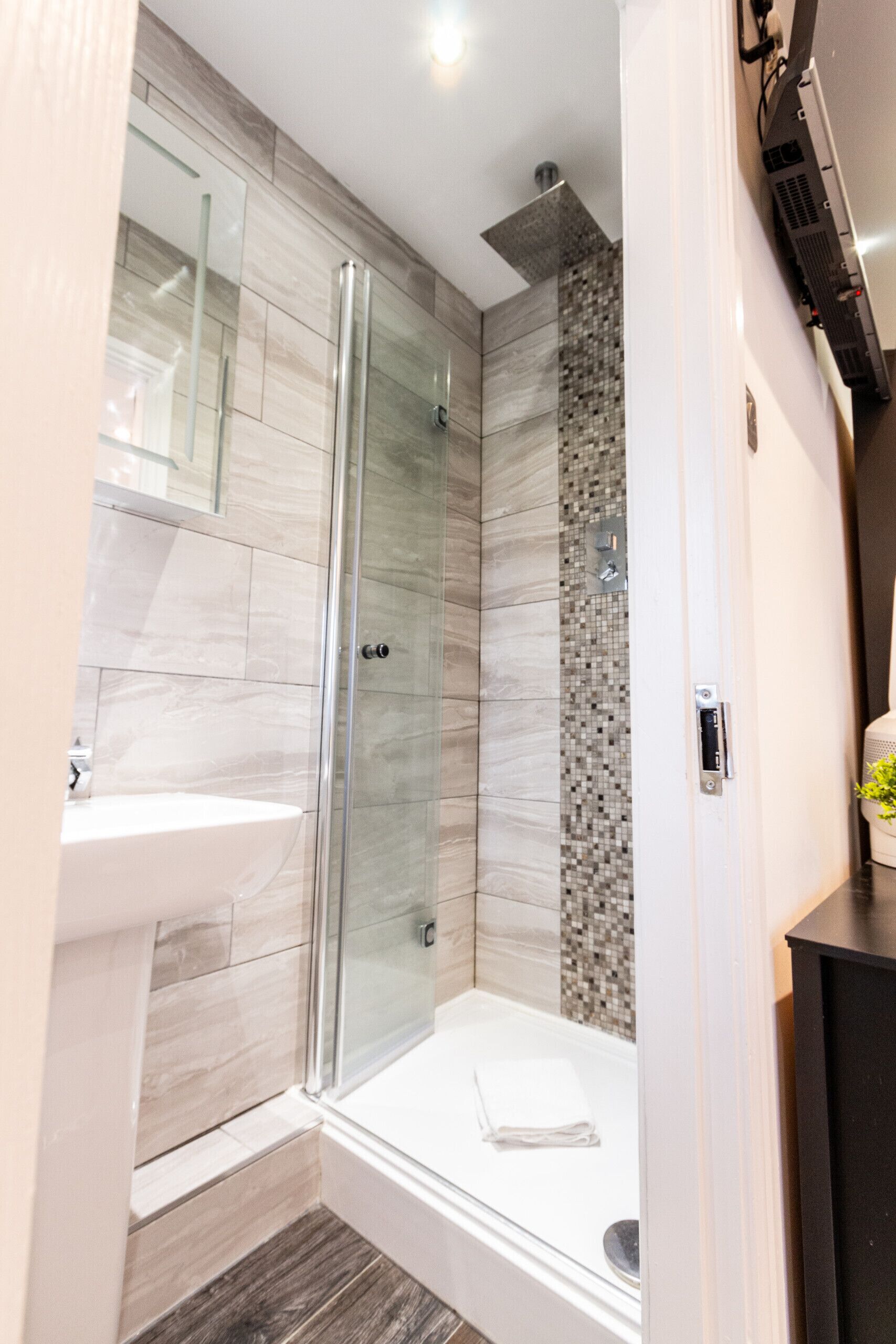Shower, towels, soap, shampoo