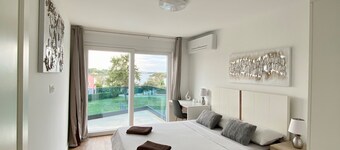 Spacious 4-Bedroom Rental with Sauna, WiFi, and A/C – Just 30m from the Beach