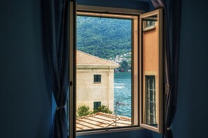 Apartment, Patio, Garden View | 1 bedroom, premium bedding, down comforters, iron/ironing board