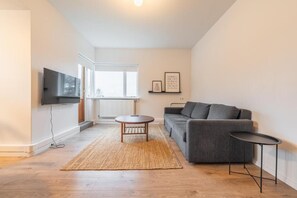 Standard Apartment, Garden View | Living area | 20-inch LCD TV with cable channels - Day Dream Soleyjargata Apartments (Reykjavik)