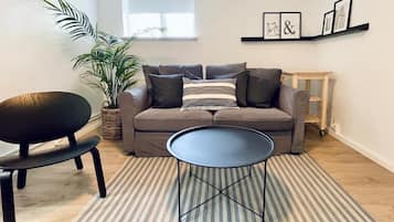 Quadruple Room | Living area | 20-inch LCD TV with cable channels
