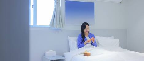 Habitación estándar | Ropa de cama de alta calidad y espacio para trabajar con un portátil