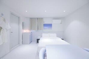 Habitación Business | Ropa de cama de alta calidad y espacio para trabajar con un portátil