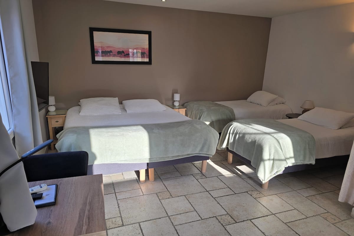 Quadruple Room | Premium bedding, desk, laptop workspace, blackout drapes