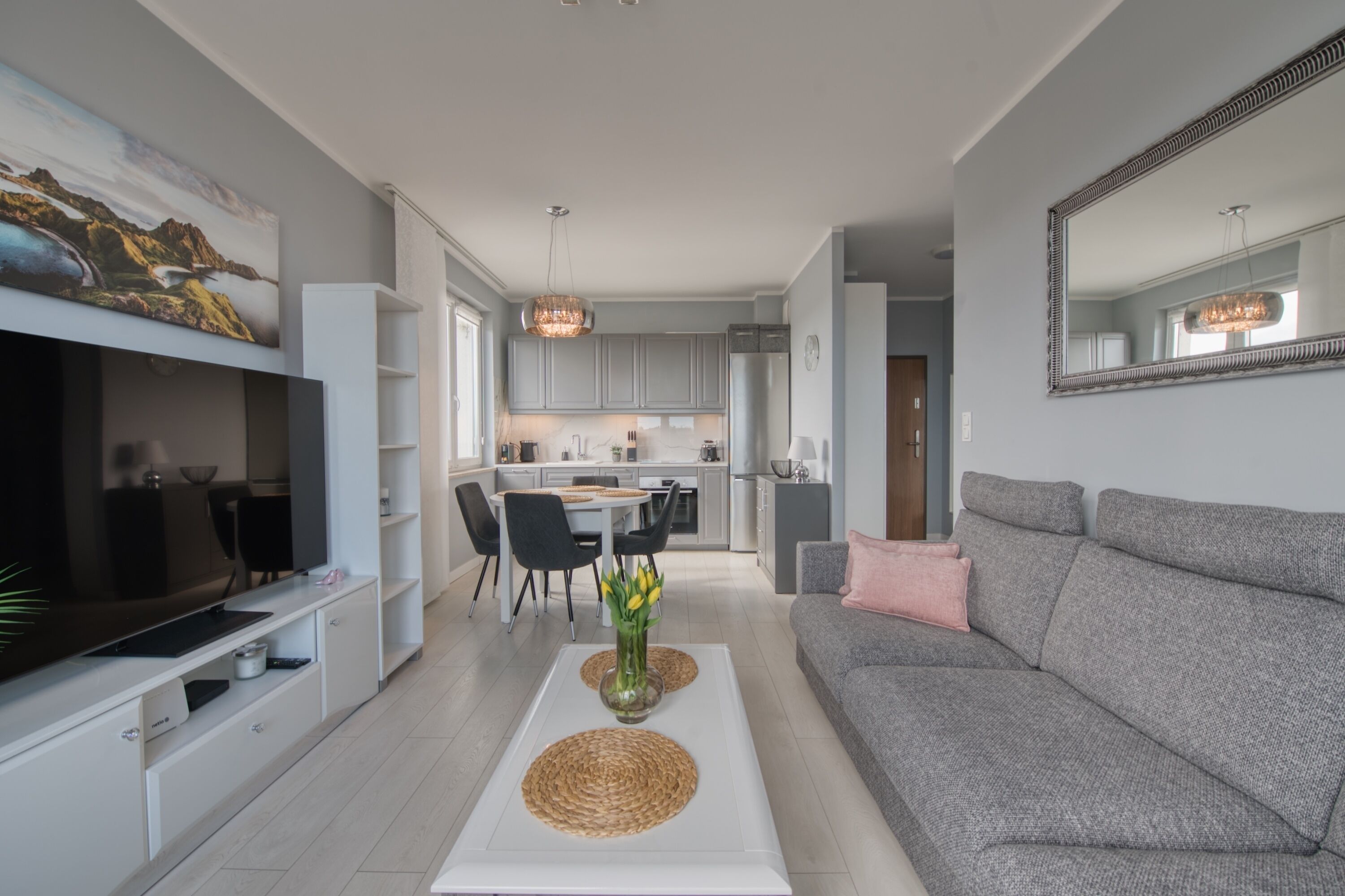 Deluxe Apartment, Balcony | Living room | Flat-screen TV