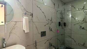 Shower, towels, soap, shampoo