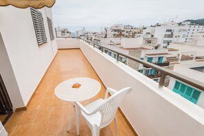 Departamento Deluxe, balcón | Terraza o patio