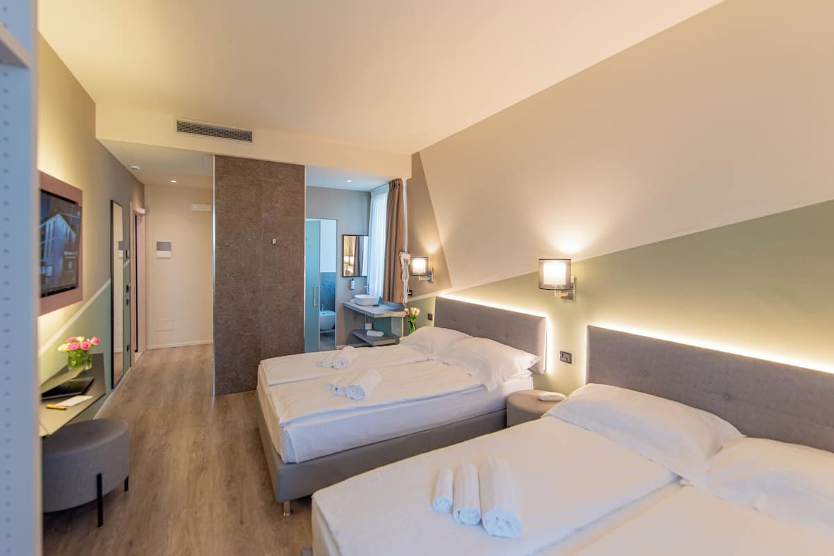 Family Room | 2 bedrooms, premium bedding, down duvets, memory-foam beds