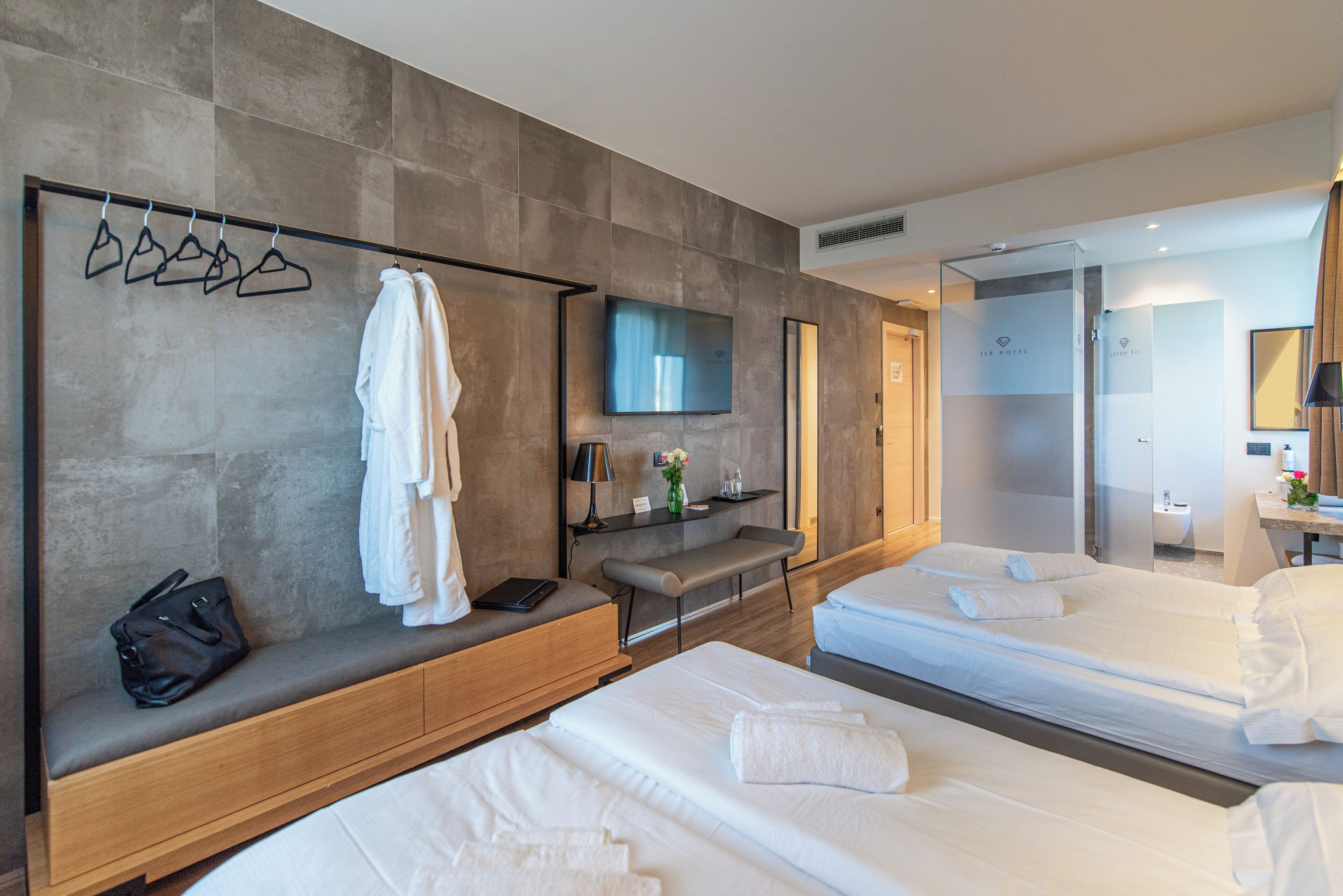 Family Room | Premium bedding, down comforters, memory foam beds, minibar