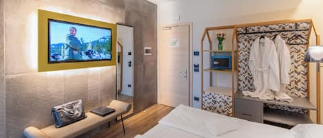 Junior Suite Doppia con doccia a vista | 2 habitaciones, ropa de cama de alta calidad y edredón