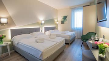 Family Room | Premium bedding, down comforters, memory foam beds, minibar