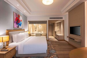 Premium bedding, down comforters, minibar, in-room safe