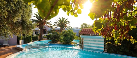 Indoor pool, outdoor pool, pool umbrellas, sun loungers