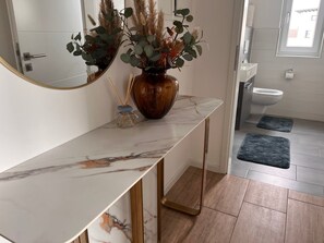 Hair dryer, towels, soap, toilet paper