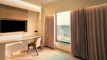 Hypo-allergenic bedding, memory-foam beds, desk, laptop workspace