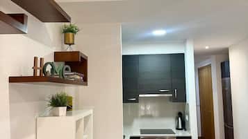 Studio | Coin séjour | Télévision, chauffage par le sol