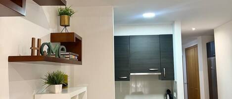 Estudio | Área de sala de estar | Televisión y piso con calefacción