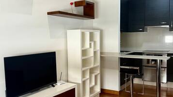 Studio | Coin séjour | Télévision, chauffage par le sol