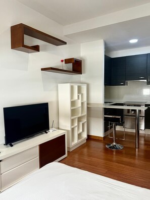 Studio | Living area | TV, heated floors