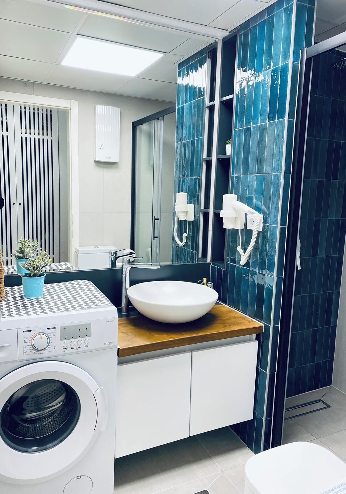 Hair dryer, towels, soap, shampoo