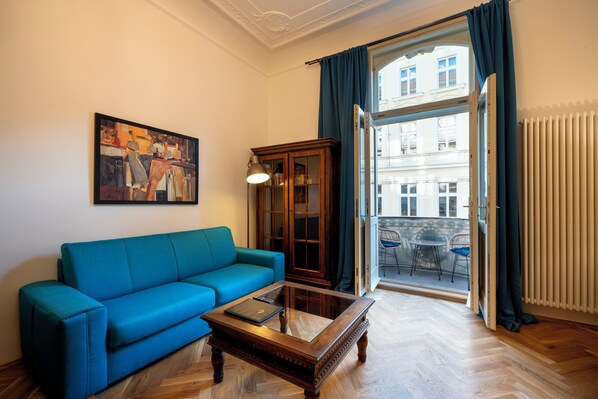 Family Apartment, 2 Bedrooms, City View | Living area - Old Town - Aparthotel 28. Října (Prague)