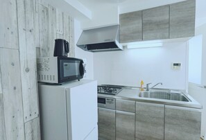Appartement familial, 2 lits doubles | Cuisine privée | Réfrigérateur, four à micro-ondes, surface de cuisson