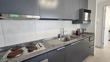 Apartment | Private kitchen | Fridge, microwave, oven, electric kettle