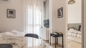 Basic Apartment | Living area | Flat-screen TV