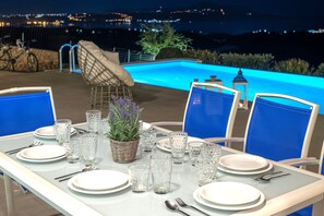 Outdoor dining - Villa Armonia, sea view, big heated pool, good privacy, 8 mins by car to beach. (Gavalohori)