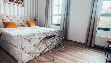 In-room safe, laptop workspace, blackout drapes, soundproofing