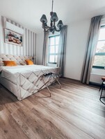 In-room safe, laptop workspace, blackout drapes, soundproofing