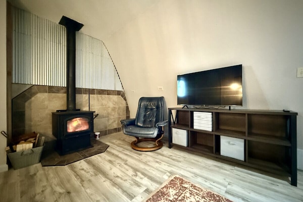 Chilly from hitting the slopes all day? This fireplace will keep you warm and cozy! Firewood is provided.