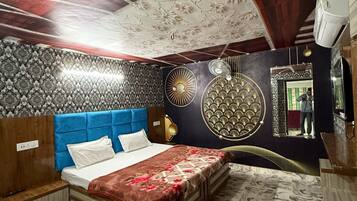 Desk, laptop workspace, bed sheets