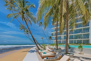 2 outdoor pools, open 8:00 AM to 8:00 PM, pool umbrellas, sun loungers