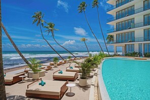 2 outdoor pools, open 7:00 AM to 9:00 AM, pool umbrellas, sun loungers - Radisson Collection Resort, Galle (Talpe)