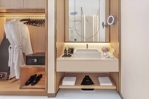 Suite, 1 Bedroom (with Pool-Beachfront) | Bathroom | Rainfall showerhead, hair dryer, bathrobes, slippers