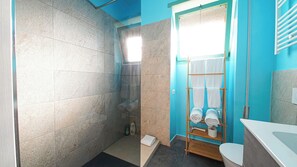 Eco-friendly toiletries, hair dryer, towels, soap