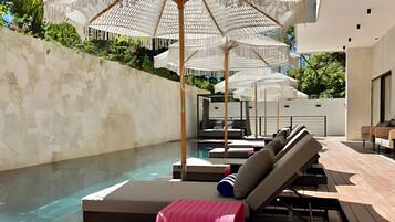 Outdoor pool, pool umbrellas, sun loungers